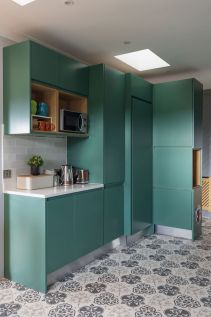 Handless-contemporary-utility-cabinets-by-AlenaCDesign